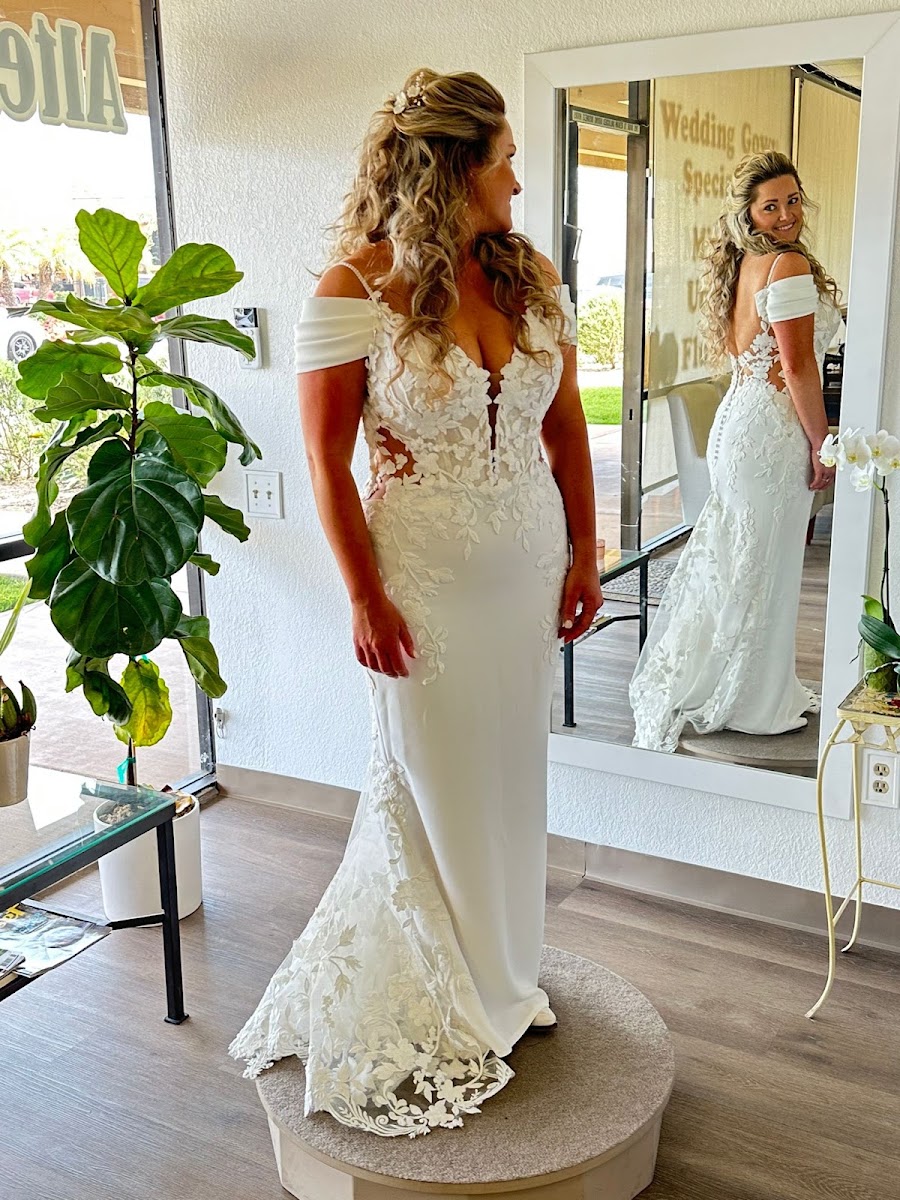 Off-the-shoulder lace mermaid wedding gown, tailored to fit